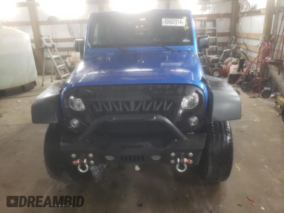 2015 Jeep Wrangler Willys Wheeler with VIN 1C4AJWAG2FL568130, listed as a Copart auction lot 80682914 with 111,686 mi miles and Salvage title. Bid and sale history available at DreamBid. Image 5.