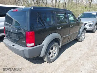 2007 Dodge Nitro SXT with VIN 1D8GU28K57W551957, listed as a IAAI auction lot 41914919 with 139,560 mi miles. Bid and sale history available at carsss.com. Image 4.