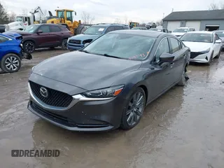 2020 Mazda 6 Grand Touring with VIN JM1GL1TYXL1524543, listed as a IAAI auction lot 41474337 with 52,160 mi miles and . Bid and sale history available at DreamBid. Image 18.
