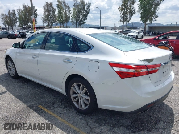 2014 Toyota Avalon Limited z VIN 4T1BK1EB1EU117097, wystawiony jako IAAI lot #41937996 z przebiegiem 169 336 mil mil oraz . Historia ofert i sprzedaży dostępna na DreamBid. Obrazek 3.