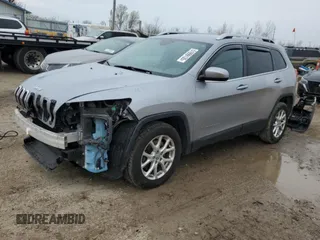 2014 Jeep Cherokee Latitude with VIN 1C4PJLCS5EW169008, listed as a Copart auction lot 51999135 with 180,153 mi miles and Salvage Title. Bid and sale history available at DreamBid. Image 1.