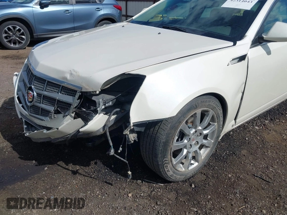 2009 Cadillac CTS AWD z VIN 1G6DT57V090104530, wystawiony jako IAAI lot #42314043 z przebiegiem 96 109 mil mil oraz . Historia ofert i sprzedaży dostępna na DreamBid. Obrazek 6.