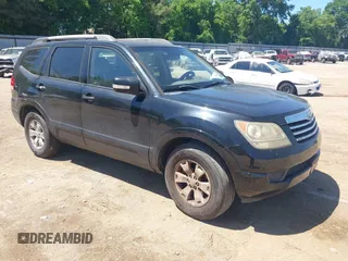 2009 Kia Borrego LX with VIN KNDJJ741395033538, listed as a IAAI auction lot 42088382 with 119,225 mi miles. Bid and sale history available at carsss.com. Image 1.