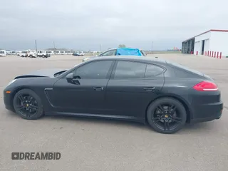 2015 Porsche Panamera 4 z VIN WP0AA2A7XFL001463, wystawiony jako IAAI lot #42139727 z przebiegiem 90 702 mil mil oraz . Historia ofert i sprzedaży dostępna na DreamBid. Obrazek 14.