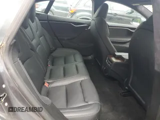 2020 Tesla Model S Long Range с VIN 5YJSA1E28LF390602, выставлен на аукционе Copart как лот 63778115 с пробегом 39 802 миль миль и Списание • Salvage title. История ставок и продаж доступна на DreamBid. Изображение 10.