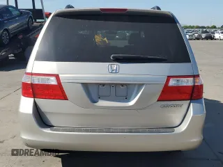 2005 Honda Odyssey EX-L z VIN 5FNRL386X5B407129, wystawiony jako Copart lot #56366655 z przebiegiem 181 893 mil mil oraz Szkoda całkowita • Salvage title. Historia ofert i sprzedaży dostępna na DreamBid. Obrazek 6.
