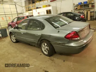 2006 Ford Taurus SE with VIN 1FAFP53UX6A187368, listed as a Copart auction lot 72020733 with 182,457 mi miles and Salvage Title. Bid and sale history available at carsss.com. Image 2.