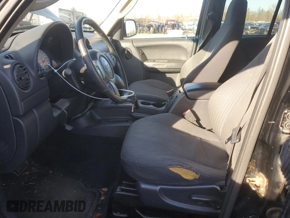 2003 Jeep Liberty Sport with VIN 1J4GK48KX3W658457, listed as a Copart auction lot 41863855 with 194,747 mi miles and Salvage Title. Bid and sale history available at DreamBid. Image 7.