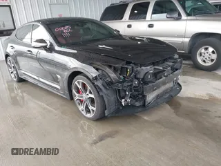 2020 Kia Stinger GT1 with VIN KNAE45LC5L6075904, listed as a IAAI auction lot 40870197 with 51,600 mi miles. Bid and sale history available at carsss.com. Image 1.