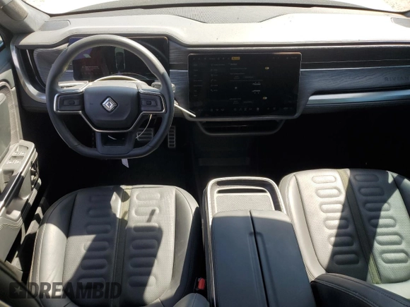 2023 Rivian R1S Launch Edition z VIN 7PDSGABLXPN004161, wystawiony jako Copart lot #67390954 z przebiegiem Nie podano mil oraz Szkody całkowita. Historia ofert i sprzedaży dostępna na DreamBid. Obrazek 8.