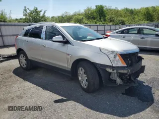 2014 Cadillac SRX Luxury Collection z VIN 3GYFNEE37ES630832, wystawiony jako Copart lot #56335035 z przebiegiem 102 076 mil mil oraz Szkody całkowita. Historia ofert i sprzedaży dostępna na DreamBid. Obrazek 4.