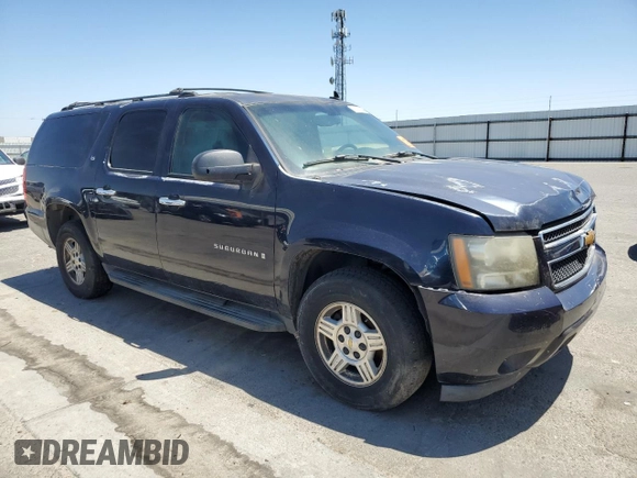 2007 Chevrolet Suburban LS z VIN 1GNFC160X7J180517, wystawiony jako Copart lot #63933475 z przebiegiem Nie podano mil oraz Czysty tytuł • Clean title. Historia ofert i sprzedaży dostępna na DreamBid. Obrazek 4.