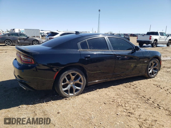 2015 Dodge Charger RT with VIN 2C3CDXCT0FH805909, listed as a Copart auction lot 42612035 with 77,493 mi miles and Salvage title. Bid and sale history available at DreamBid. Image 3.