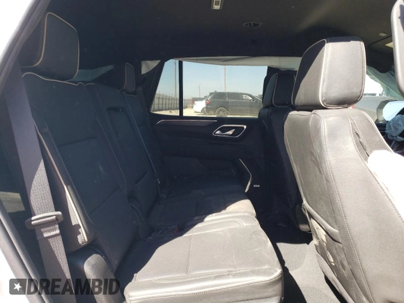 2024 GMC Yukon SLT with VIN 1GKS2BKD6RR237359, listed as a Copart auction lot 77892564 with 9,880 mi miles and Salvage Title. Bid and sale history available at carsss.com. Image 12.