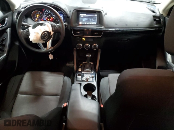 2016 Mazda CX-5 Sport with VIN JM3KE4BY9G0785317, listed as a Copart auction lot 48300935 with 32,592 mi miles and Salvage Title. Bid and sale history available at carsss.com. Image 8.