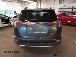 2018 Toyota RAV4 XLE with VIN JTMRFREV8JJ208377, listed as a IAAI auction lot 41629369 with 160,870 mi miles. Bid and sale history available at carsss.com. Image 16.