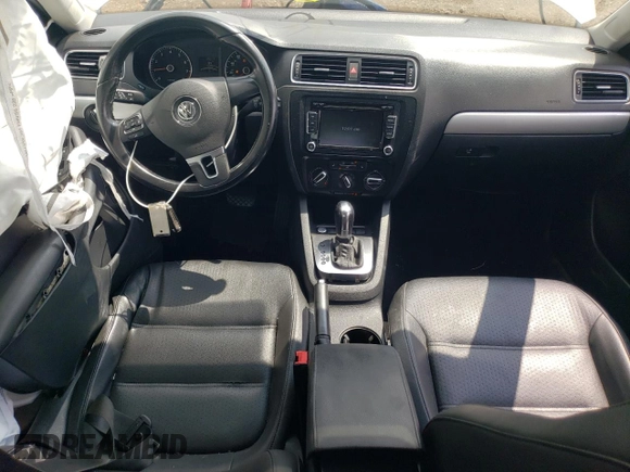 2014 Volkswagen Jetta Sedan SE w/Connectivity with VIN 3VWD07AJ0EM441517, listed as a Copart auction lot 65257454 with 132,987 mi miles and Salvage Title. Bid and sale history available at carsss.com. Image 8.