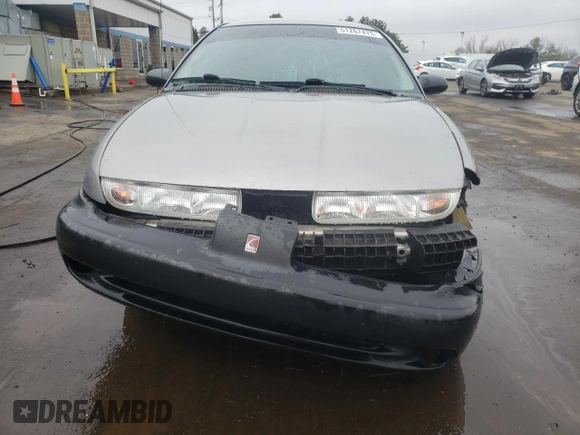 1996 Saturn SL with VIN 1G8ZK5272TZ265571, listed as a Copart auction lot 51267475 with 142,824 mi miles and Salvage Title. Bid and sale history available at carsss.com. Image 5.