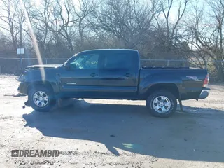2009 Toyota Tacoma PreRunner with VIN 3TMJU62N99M074807, listed as a IAAI auction lot 41664211 with 230,481 mi miles. Bid and sale history available at carsss.com. Image 15.