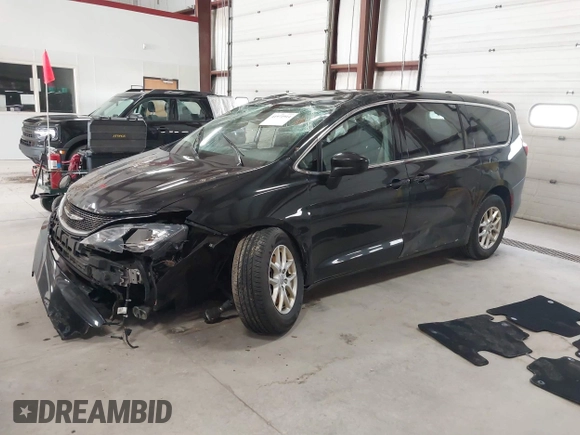 2017 Chrysler Pacifica Touring with VIN 2C4RC1DGXHR585294, listed as a IAAI auction lot 41971914 with 153,028 mi miles and . Bid and sale history available at DreamBid. Image 2.