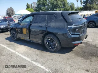 2025 BMW iX xDrive50 z VIN WB523CF02SCS06555, wystawiony jako Copart lot #55291115 z przebiegiem Nie podano mil oraz Szkoda całkowita • Salvage title. Historia ofert i sprzedaży dostępna na DreamBid. Obrazek 2.
