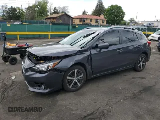 2023 Subaru Impreza Premium with VIN 4S3GTAV60P3722201, listed as a Copart auction lot 58667795 with 14,742 mi miles and Salvage title. Bid and sale history available at DreamBid. Image 1.