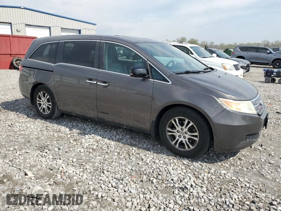 2013 Honda Odyssey EX-L with VIN 5FNRL5H61DB030264, listed as a Copart auction lot 50453505 with 182,015 mi miles and Salvage Title. Bid and sale history available at carsss.com. Image 4.