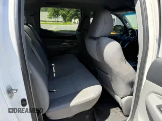 2013 Toyota Tacoma with VIN 5TFLU4EN1DX063442, listed as a Copart auction lot 62521295 with 211,682 mi miles and Clean title. Bid and sale history available at DreamBid. Image 6.