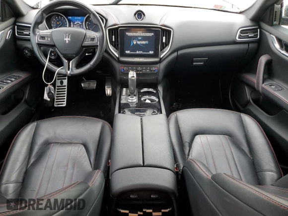 2019 Maserati Ghibli z VIN ZAM57XSA2K1328545, wystawiony jako Copart lot #56291895 z przebiegiem 53 625 mil mil oraz Tytuł czysty. Historia ofert i sprzedaży dostępna na DreamBid. Obrazek 8.