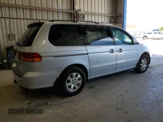 2002 Honda Odyssey EX z VIN 5FNRL18622B049511, wystawiony jako Copart lot #55265485 z przebiegiem 208 693 mil mil oraz Czysty tytuł • Clean title. Historia ofert i sprzedaży dostępna na DreamBid. Obrazek 3.