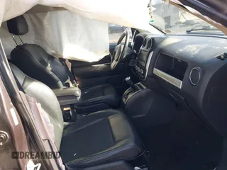 2017 Jeep Compass High Altitude with VIN 1C4NJDEB1HD111889, listed as a IAAI auction lot 41509294 with 104,038 mi miles. Bid and sale history available at carsss.com. Image 5.