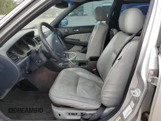 2004 Acura RL w/Navigation System z VIN JH4KA96664C003428, wystawiony jako Copart lot #87115774 z przebiegiem 164 527 mil mil oraz Szkoda całkowita • Salvage title. Historia ofert i sprzedaży dostępna na DreamBid. Obrazek 7.