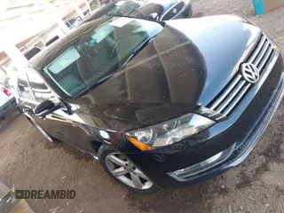 2015 Volkswagen Passat 1.8T Wolfsburg Ed with VIN 1VWAT7A3XFC115349, listed as a IAAI auction lot 41705717 with 159,138 mi miles. Bid and sale history available at carsss.com. Image 1.