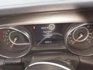 2021 Jeep Wrangler Sport with VIN 1C4GJXAN5MW627228, listed as a IAAI auction lot 42170010 with 56,965 mi miles and . Bid and sale history available at DreamBid. Image 7.