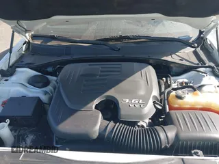 2014 Chrysler 300 S with VIN 2C3CCABG0EH235784, listed as a IAAI auction lot 41345692 with 109,920 mi miles and . Bid and sale history available at DreamBid. Image 10.