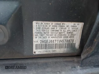 1997 Honda Civic LX z VIN 2HGEJ6671VH574878, wystawiony jako IAAI lot #42332735 z przebiegiem 246 181 mil mil oraz . Historia ofert i sprzedaży dostępna na DreamBid. Obrazek 9.