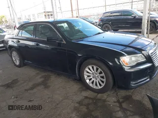 2013 Chrysler 300 with VIN 2C3CCAAG7DH504556, listed as a IAAI auction lot 41949835 with 240,300 mi miles and . Bid and sale history available at DreamBid. Image 1.