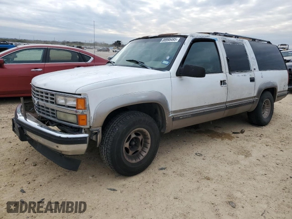1999 Chevrolet Suburban with VIN 1GNEC16R7XJ418169, listed as a Copart auction lot 88995495 with 2,015,240 mi miles and Salvage title. Bid and sale history available at DreamBid. Image 1.