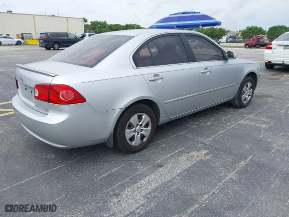 2007 Kia Optima LX with VIN KNAGE123175135348, listed as a IAAI auction lot 41887004 with 149,094 mi miles. Bid and sale history available at carsss.com. Image 4.