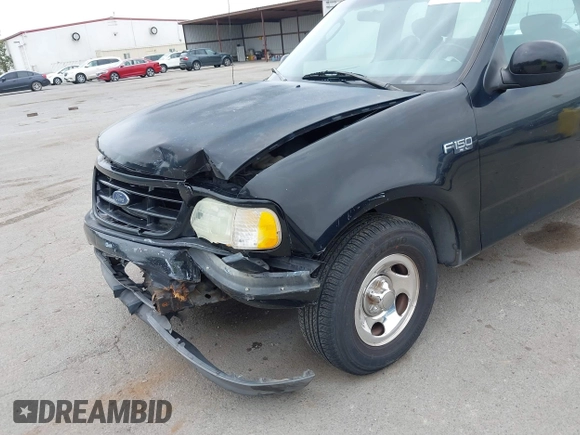 2002 Ford F-150 XL с VIN 1FTRX17242NB23323, выставлен на аукционе IAAI как лот 42363484 с пробегом Не указан миль и . История ставок и продаж доступна на DreamBid. Изображение 6.