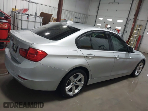 2014 BMW 3 Series 328d xDrive with VIN WBA3D5C55EF147308, listed as a IAAI auction lot 41499435 with 104,941 mi miles. Bid and sale history available at carsss.com. Image 14.