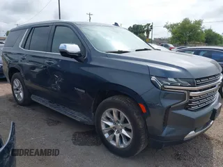 2021 Chevrolet Tahoe Premier z VIN 1GNSKSKD6MR294690, wystawiony jako IAAI lot #42196702 z przebiegiem 94 661 mil mil oraz . Historia ofert i sprzedaży dostępna na DreamBid. Obrazek 1.