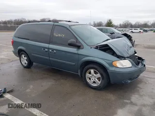 2005 Dodge Caravan SXT z VIN 2D4GP44LX5R115310, wystawiony jako IAAI lot #41668454 z przebiegiem 115 784 mil mil oraz . Historia ofert i sprzedaży dostępna na DreamBid. Obrazek 1.