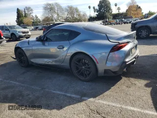 2021 Toyota GR Supra 3.0 with VIN WZ1DB0C00MW039702, listed as a Copart auction lot 89028515 with 42,426 mi miles and Salvage Title. Bid and sale history available at carsss.com. Image 2.