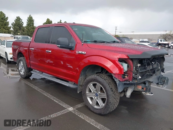2015 Ford F-150 XLT with VIN 1FTEW1E89FFB76849, listed as a IAAI auction lot 41936016 with 107,773 mi miles and . Bid and sale history available at carsss.com. Image 1.