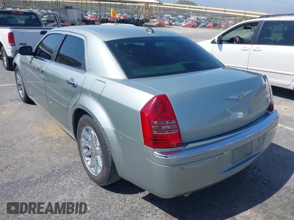 2006 Chrysler 300 C with VIN 2C3LA63H26H130160, listed as a IAAI auction lot 42170192 with 124,206 mi miles. Bid and sale history available at carsss.com. Image 3.