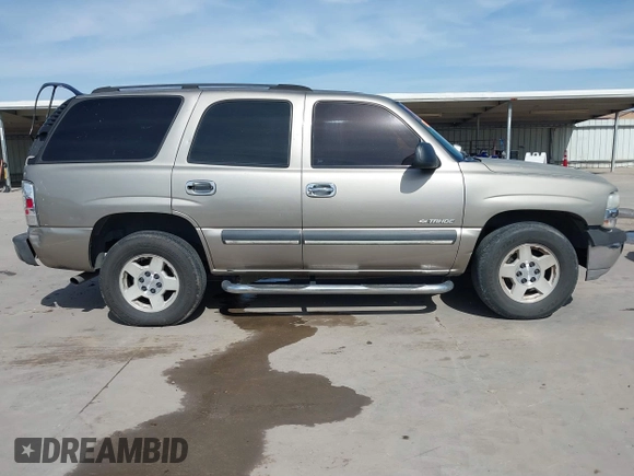 2003 Chevrolet Tahoe LS with VIN 1GNEC13V23R141539, listed as a IAAI auction lot 41812195 with 486,815 mi miles. Bid and sale history available at carsss.com. Image 14.