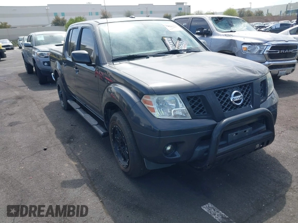 2014 Nissan Frontier SV with VIN 1N6AD0ER8EN756702, listed as a IAAI auction lot 42021294 with 135,143 mi miles and . Bid and sale history available at DreamBid. Image 1.