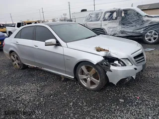 2012 Mercedes-Benz E-Class E 350 Luxury with VIN WDDHF5KB4CA618729, listed as a IAAI auction lot 41074382 with 115,060 mi miles. Bid and sale history available at carsss.com. Image 1.