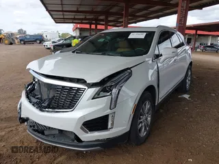 2021 Cadillac XT5 FWD Premium Luxury with VIN 1GYKNCRS5MZ224957, listed as a IAAI auction lot 41794648 with 28,540 mi miles and . Bid and sale history available at carsss.com. Image 17.